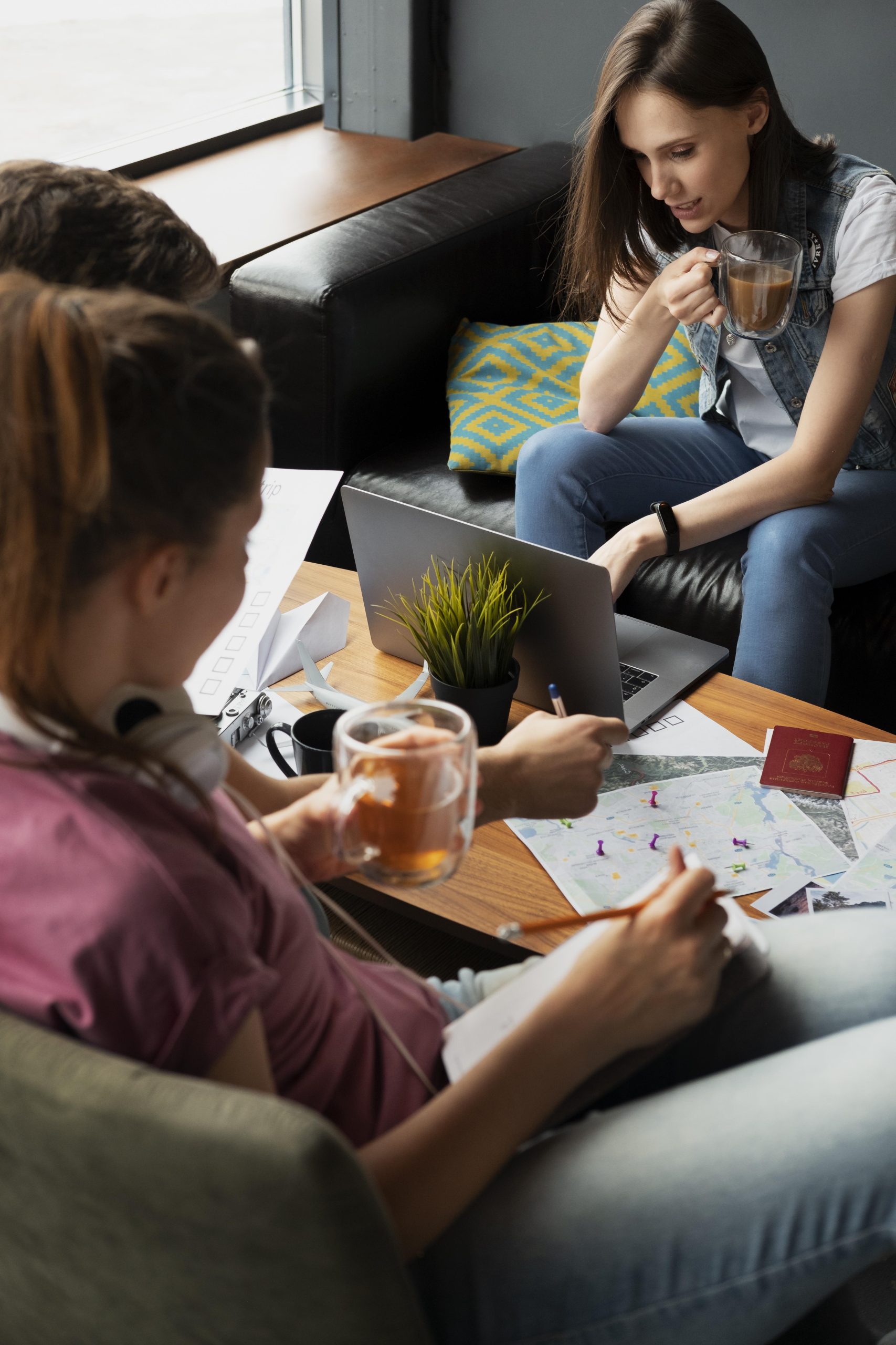 close up friends planning trip together scaled